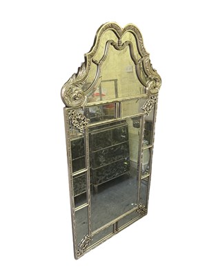 Lot 37 - A large Venetian style plate glass wall mirror...