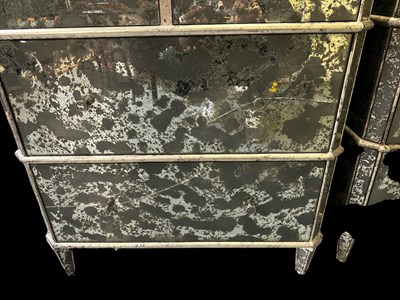 Lot 83 - A pair of modern mirrored chests of two short...