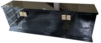 Lot 109 - A large modern black two door sideboard with...
