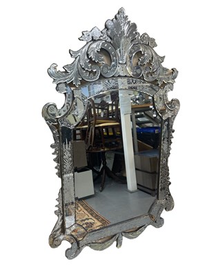 Lot 29 - A large Venetian style wall mirror (af),...