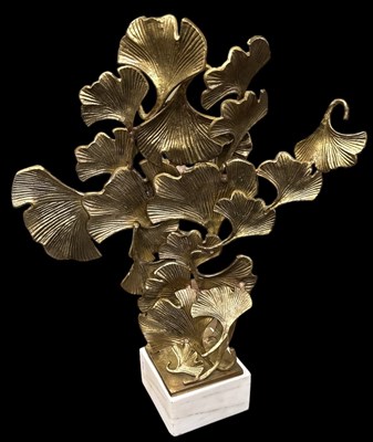 Lot 577 - A modern gilt metal floral sculpture on white...