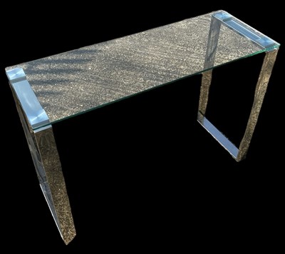 Lot 104 - A modern glass topped hall table on square...