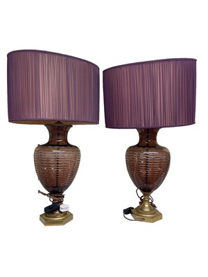 Lot 175 - A pair of modern purple glass table lamps,...