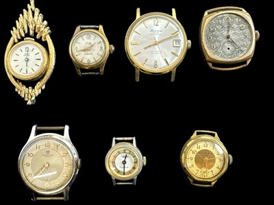 Lot 874 - A group of seven wristwatch heads, including...