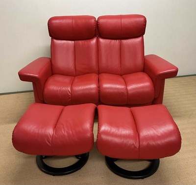 Lot 639 - STRESSLESS LEGEND; a red leather upholstered...