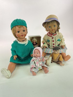 Lot 78 - A group of five dolls including a 22" 1940s...