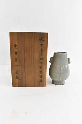 Lot 1046 - A Chinese celadon glazed Guan type vase,...