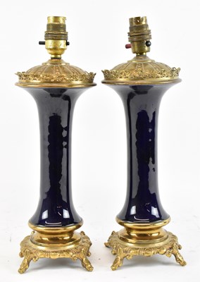 Lot 154 - A pair of 19th century blue porcelain and gilt...