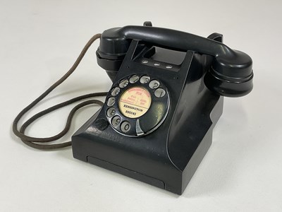 Lot 156 - A vintage black telephone with drawer and...