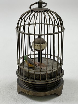 Lot 44 - An early 20th century novelty single bird...