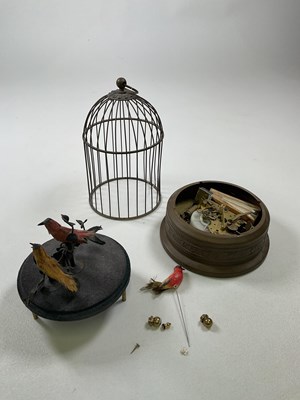 Lot 43 - An automaton singing musical birdcage for...
