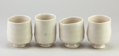 Lot 118 - ASHLEY HOWARD (born 1963); four porcelain cups...