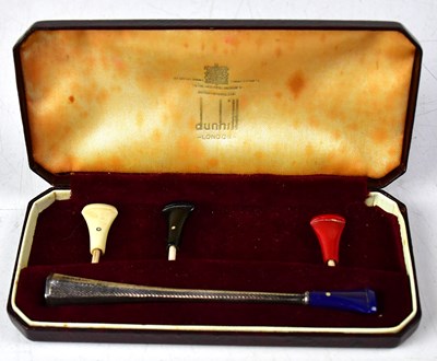 Lot 115 - DUNHILL; a hallmarked silver cigarette holder...