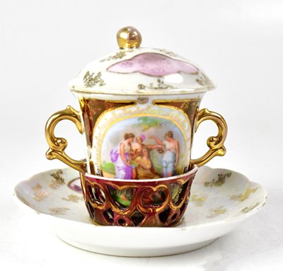 Lot 310 - ROYAL VIENNA; a twin-handled chocolate cup,...