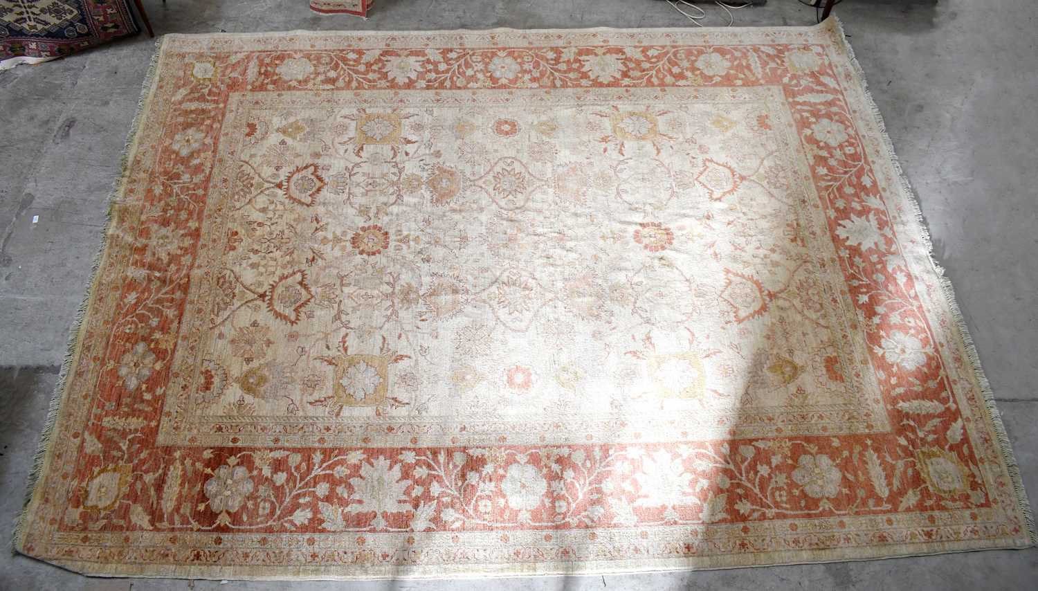 Lot 1449 A good quality wool carpet, with floral