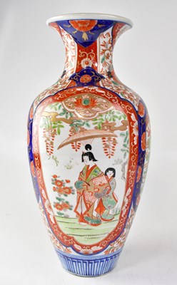 Lot 169 - A large Japanese Imari decorated baluster vase,...