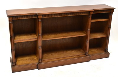 Lot 46 - A reproduction mahogany break-front bookcase...