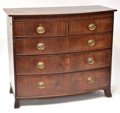 Lot 9 - A George mahogany bow-front chest of two over...