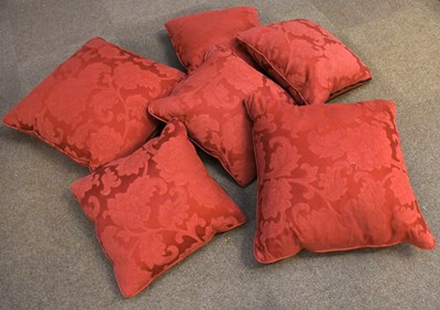 Lot 122 - Six modern red floral cushions, the largest...