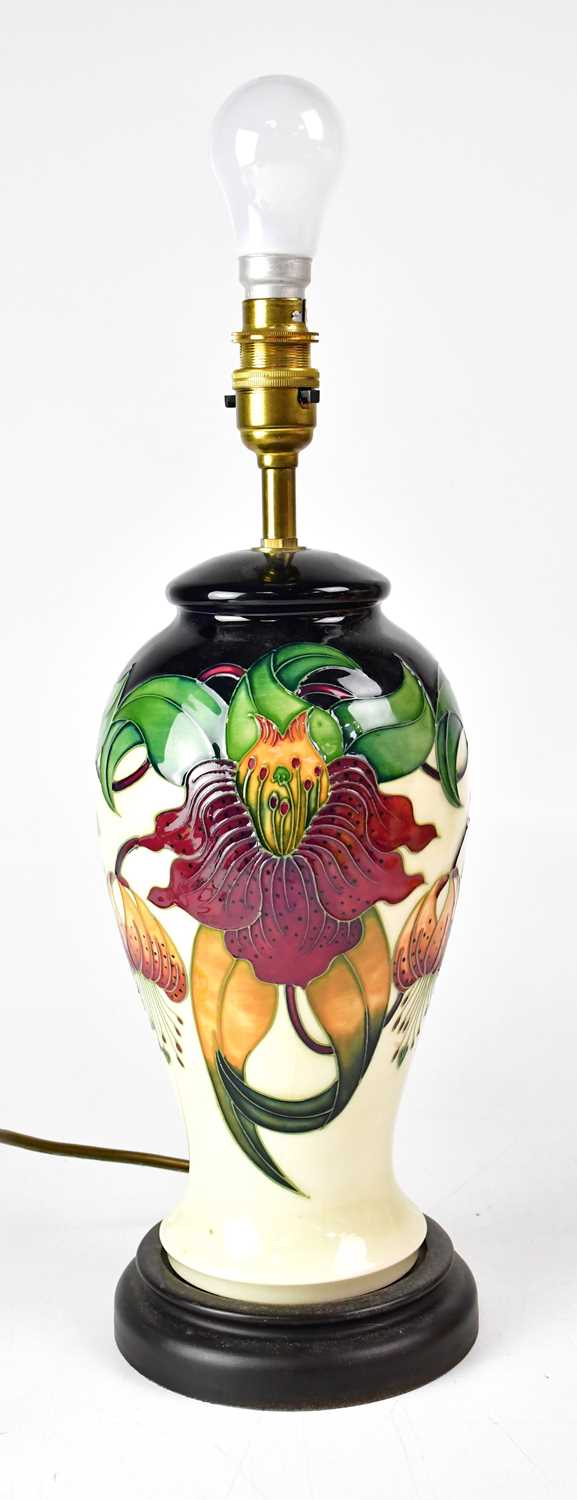 Lot 354 - MOORCROFT; an 'Anna Lily' pattern table lamp