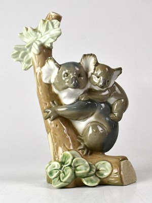 Lot 363 - LLADRÓ; a small figure group of a koala bear...