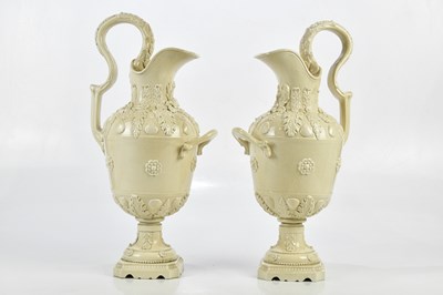 Lot 1392 - PETER WELDON; a pair of crackle glazed ewers,...