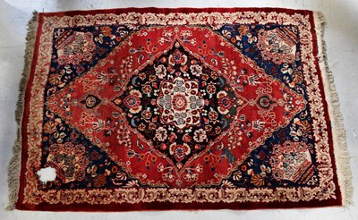 Lot 101 - A Turkmenistan Meshed hand knotted red ground...