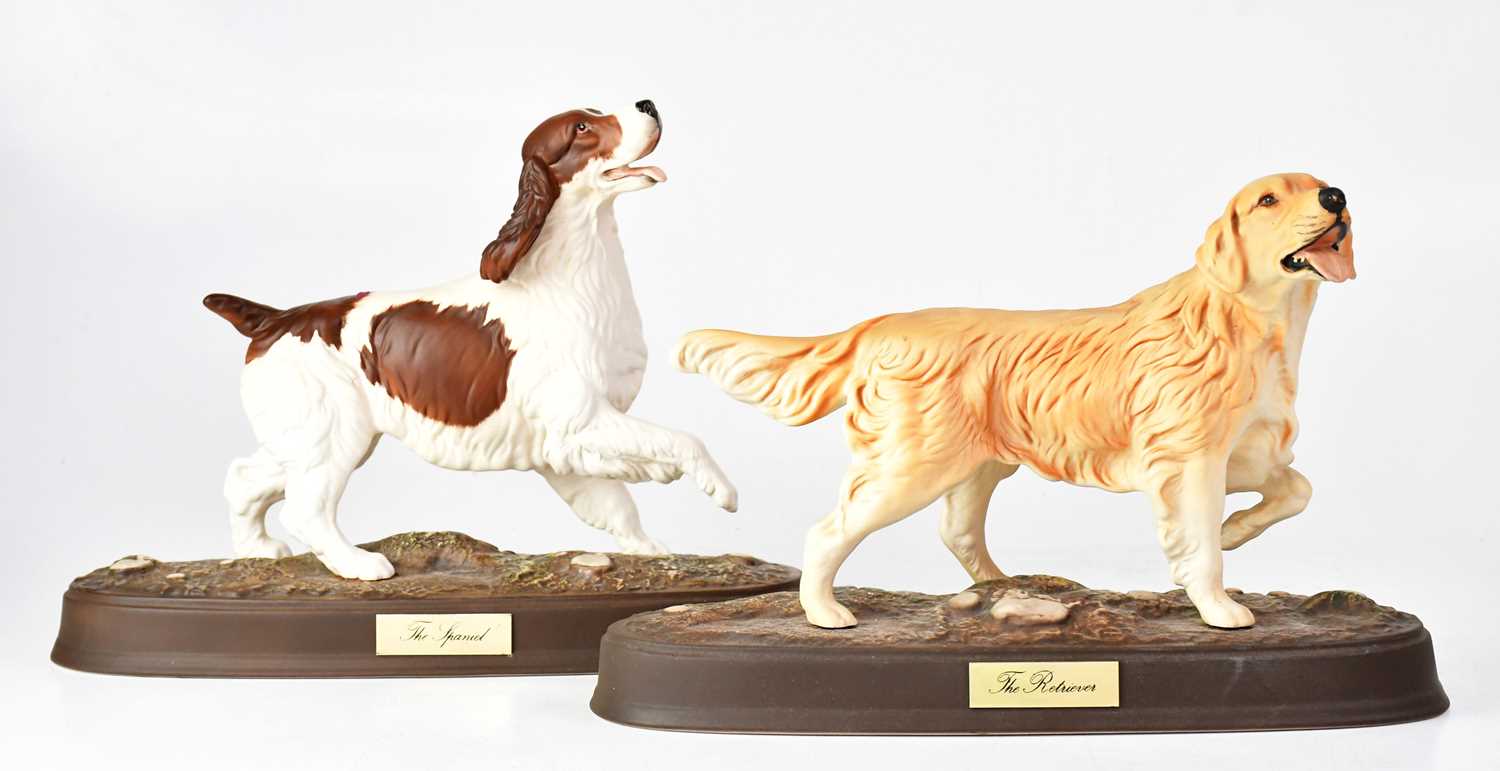 Lot 386 - BESWICK; two matt glazed figures of dogs...