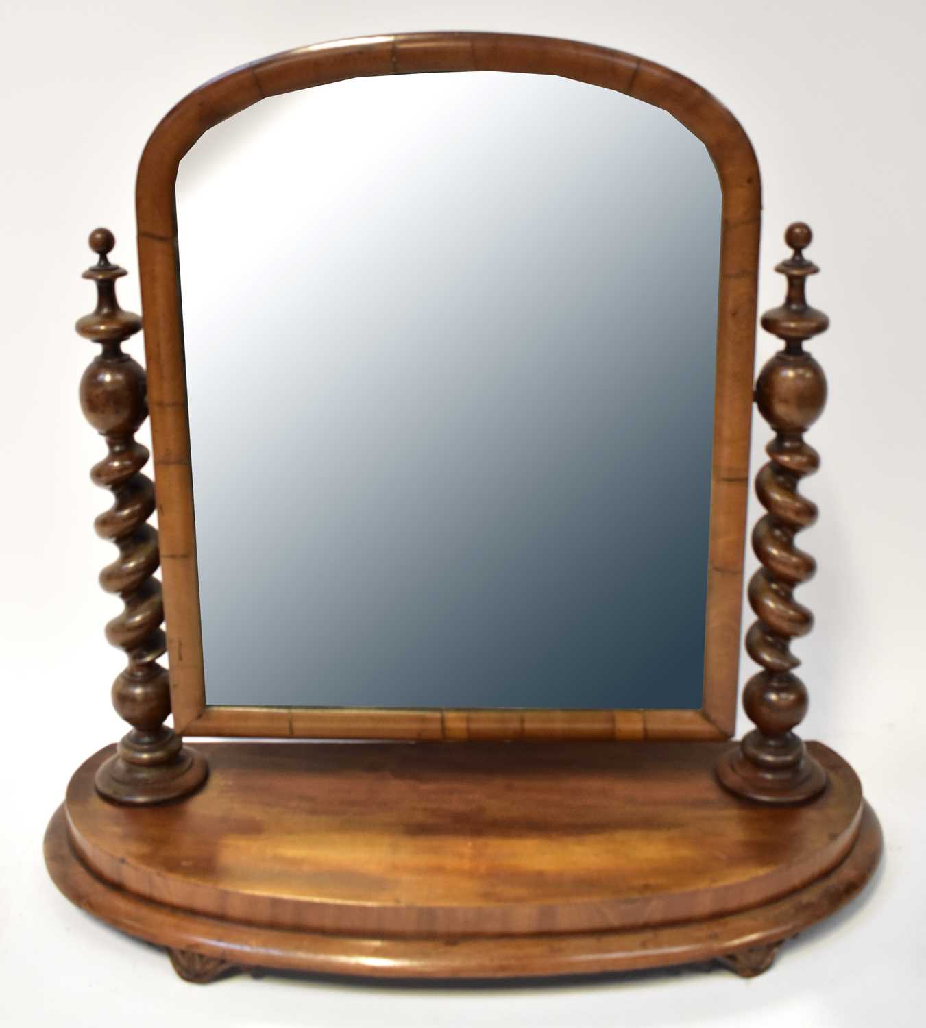 Lot 59 - A Victorian mahogany swivel mirror with twist...