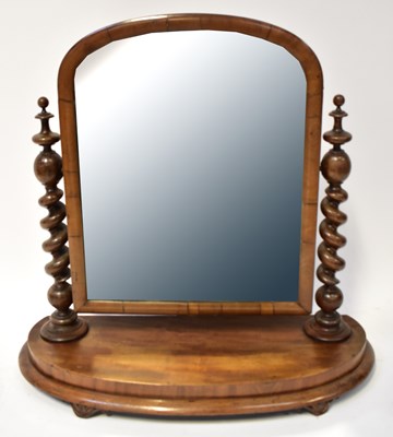 Lot 59 - A Victorian mahogany swivel mirror with twist...