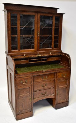 Lot 28 - An early 20th century oak bureau bookcase, the...