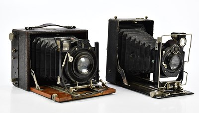 Lot 449 - Two early 20th century folding cameras,...