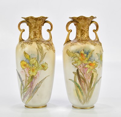 Lot 1346 - DOULTON BURSLEM; a pair of twin handled vases...