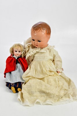 Lot 17 - A German composition doll, with sleeping eyes,...