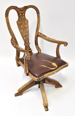 Lot 30 - An unusual circa 1920s bone inlaid swivel chair.