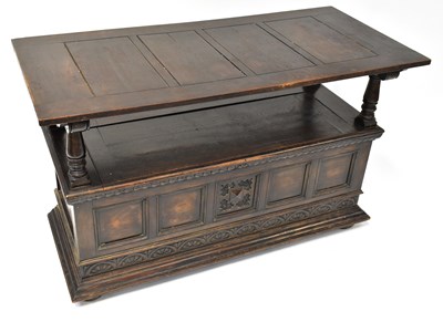 Lot 29 - An early 20th century oak monk's bench, the...
