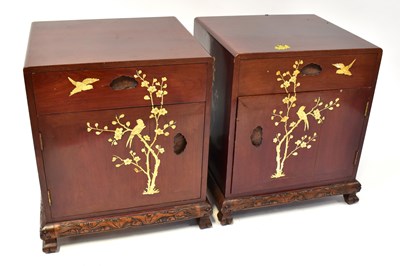 Lot 54 - A pair of Oriental-style stained mahogany...
