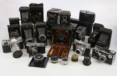 Lot 747 - A collection of film cameras, to include large...