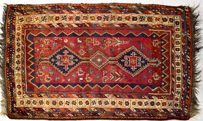 Lot 61 - An Iranian Shiraz red ground hand knotted rug