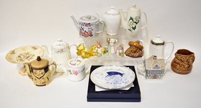 Lot 334 - A quantity of decorative teapots including...