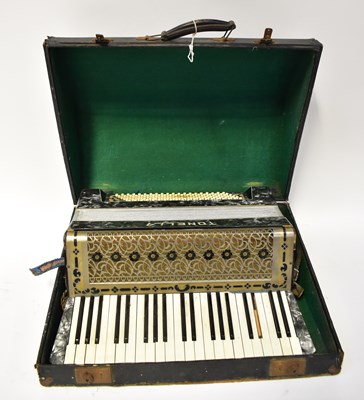 Lot 512 - A cased Tonella piano accordion (af).