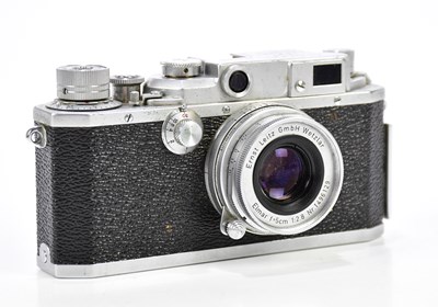 Lot 393 - CANON; a Canon IIF 35mm rangefinder camera,...