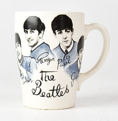 Lot 127A - THE BEATLES; a c.1960s Tams Ltd mug featuring...