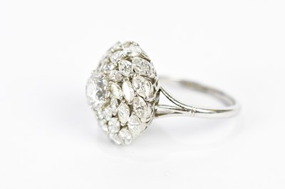 Lot 39 - A platinum diamond dress ring, with central...