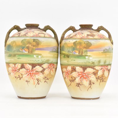 Lot 409 - A pair of hand painted Japanese porcelain...