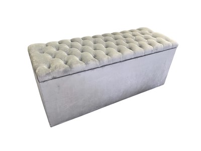 Lot 56 - A modern grey button upholstered ottoman with...