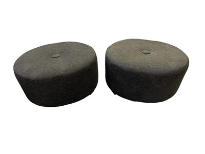 Lot 56 - A modern grey button upholstered ottoman with...