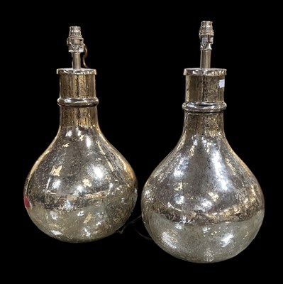 Lot 173 - A pair of mirror effect table lamps, height to...