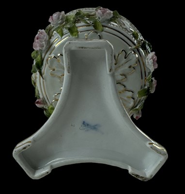 Lot 505 - A 19th century continental floral encrusted...