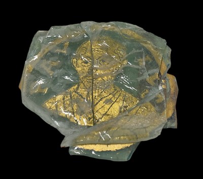 Lot 302 - An Ancient Greek style sandwich glass tablet...